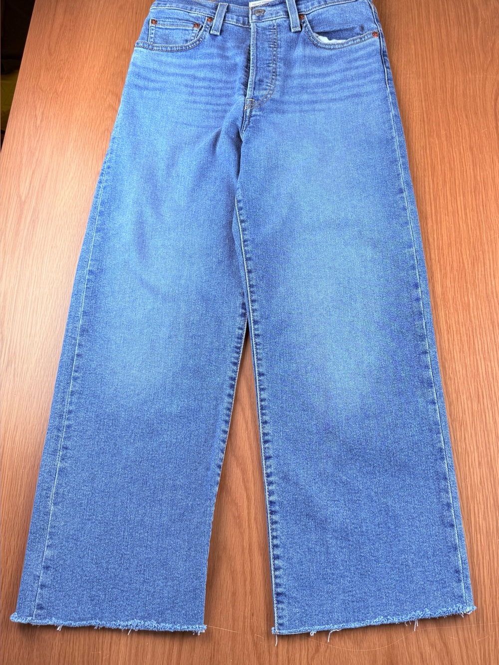 Levi’s women’s Ribcage Straight Ankle Jean Center Lane 27x27 Raw Hem NWT